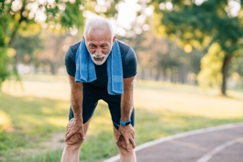 Person experiencing shortness of breath due to heart issues