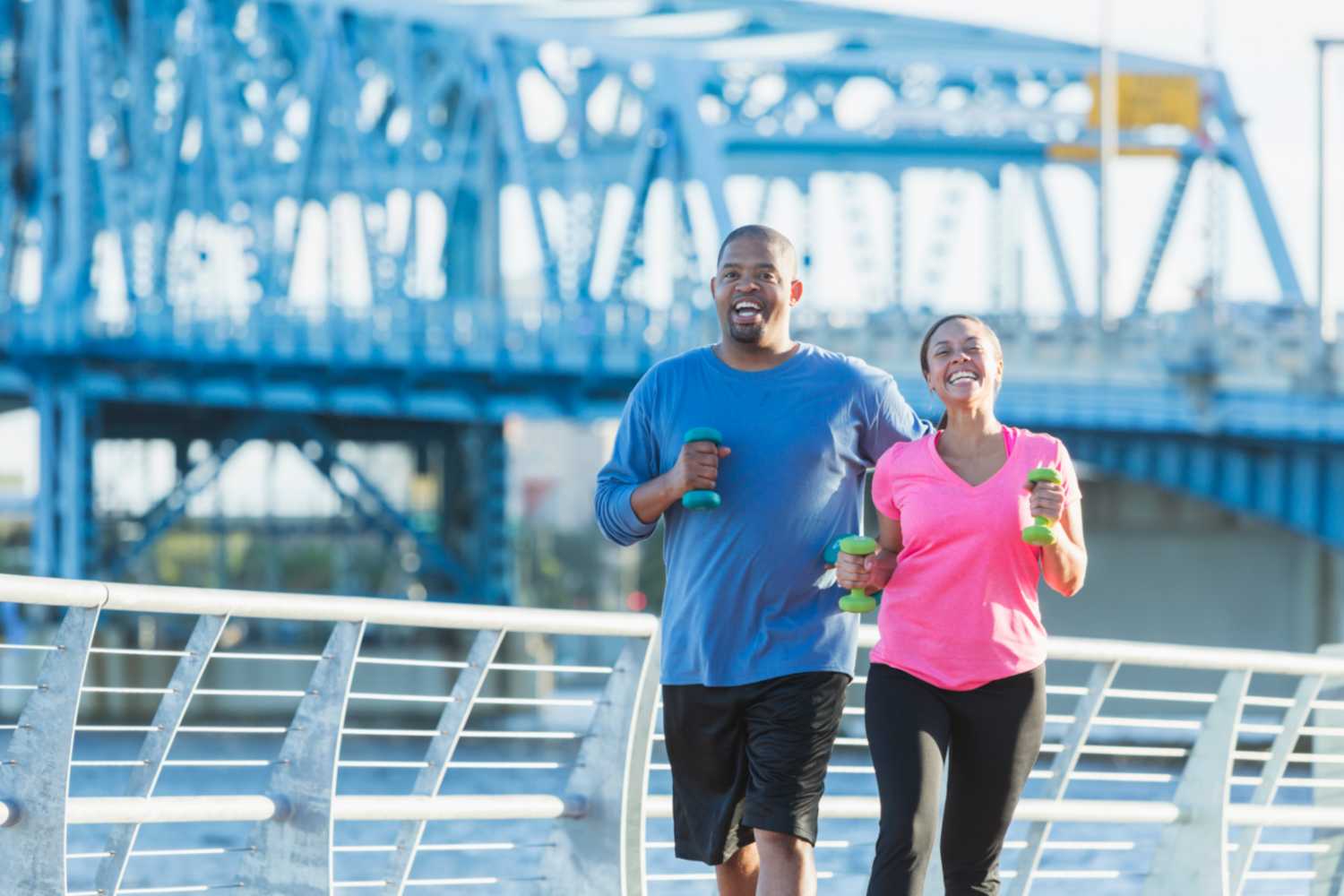 A couple jogging at a park in Sugar Land, TX